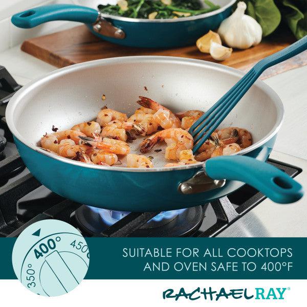 Shrimp cooking in a blue 13-Piece Nonstick Induction Cookware Set on a stove.