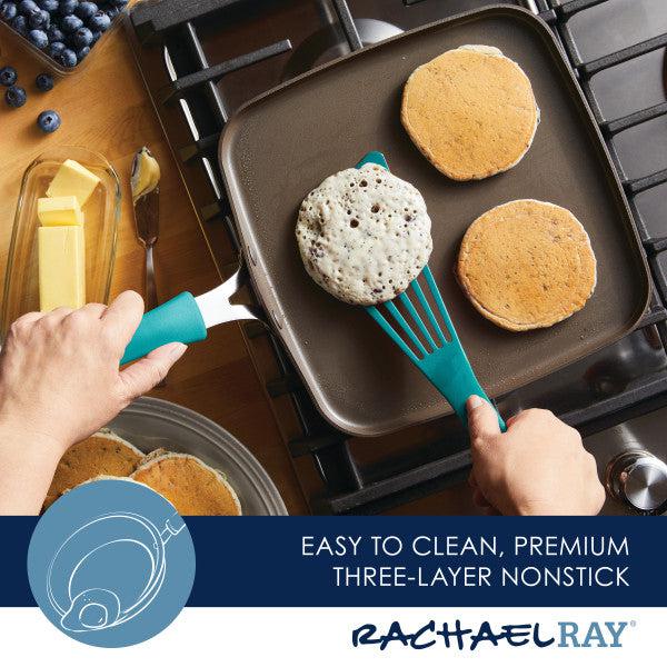 A person expertly flips pancakes on an 11-Inch Cook + Create Nonstick Square Griddle Pan with a teal spatula, showcasing the stovetop performance and durability of its thicker gauge aluminum design.
