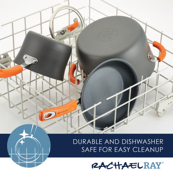 The 10-Piece Classic Brights Hard Anodized Nonstick Cookware Set, known for its elegant nonstick pots and pans with striking orange handles, sits gracefully in the dishwasher rack.