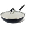 Ceramic Nonstick Stir Fry Pan with glass lid and black handle on white background.