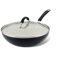 Ceramic Nonstick Stir Fry Pan with glass lid and black handle on white background.
