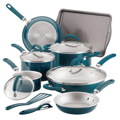 Teal nonstick cookware set with pots, pans, lids, and utensils.