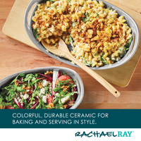 Ceramic dishes with pasta bake and salad on a wooden surface.