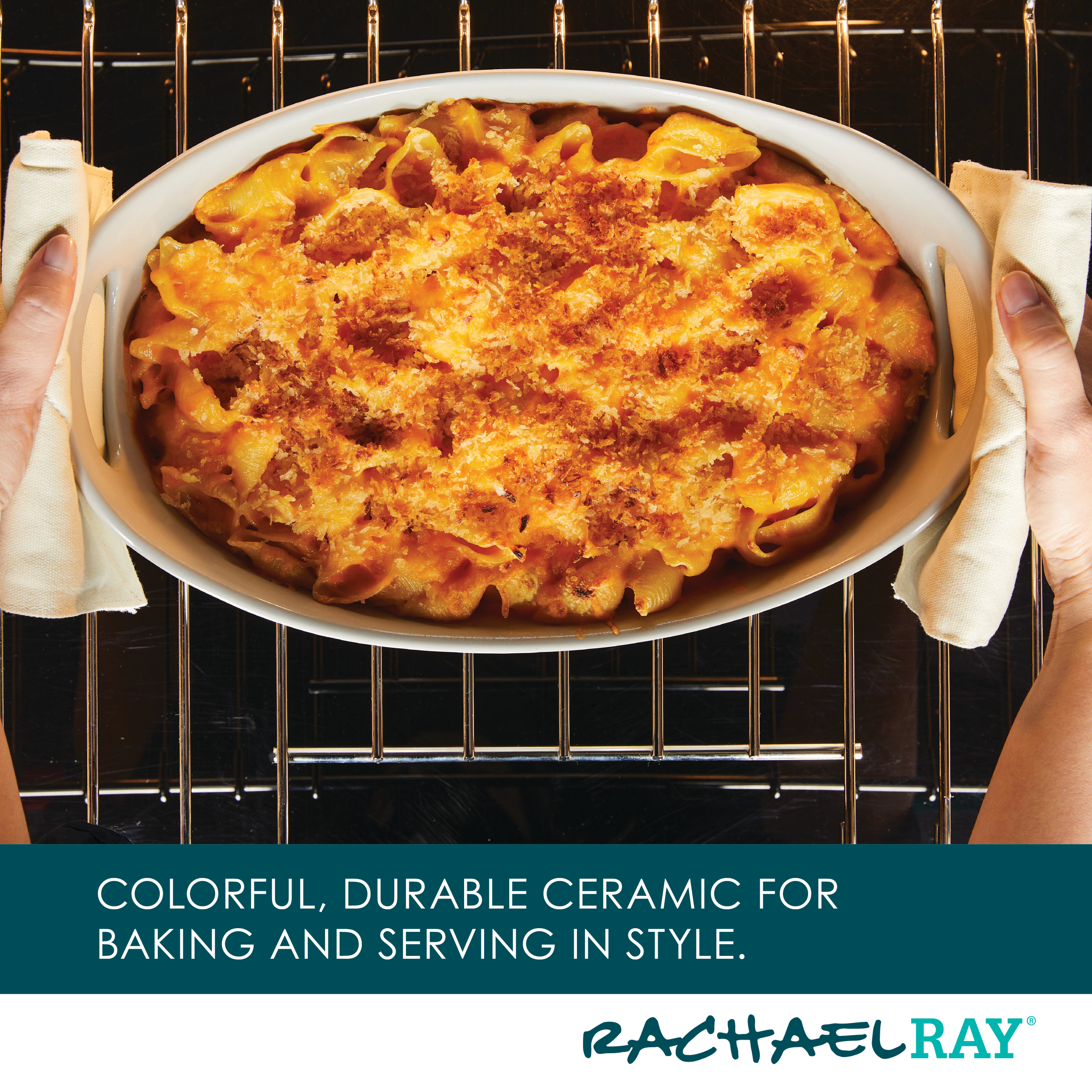 Hands holding a baked pasta dish being placed in the oven.