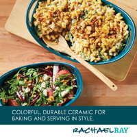 Two ceramic dishes: one with pasta bake, one with salad, and a wooden spoon.