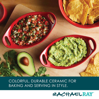 Red ceramic dishes with salsa and guacamole, avocado, cilantro, and tortilla chips.