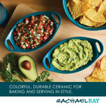 Ceramic dishes with salsa, guacamole, chips, and half an avocado.
