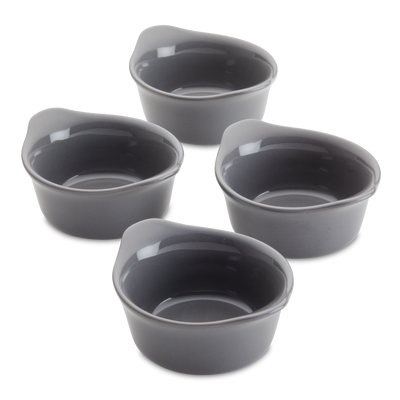 Four gray ceramic measuring cups arranged in a group.