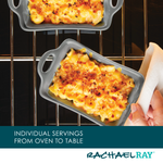 Two baked macaroni and cheese dishes being taken out of the oven.