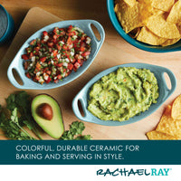 Two ceramic dishes with salsa and guacamole next to chips and avocado.