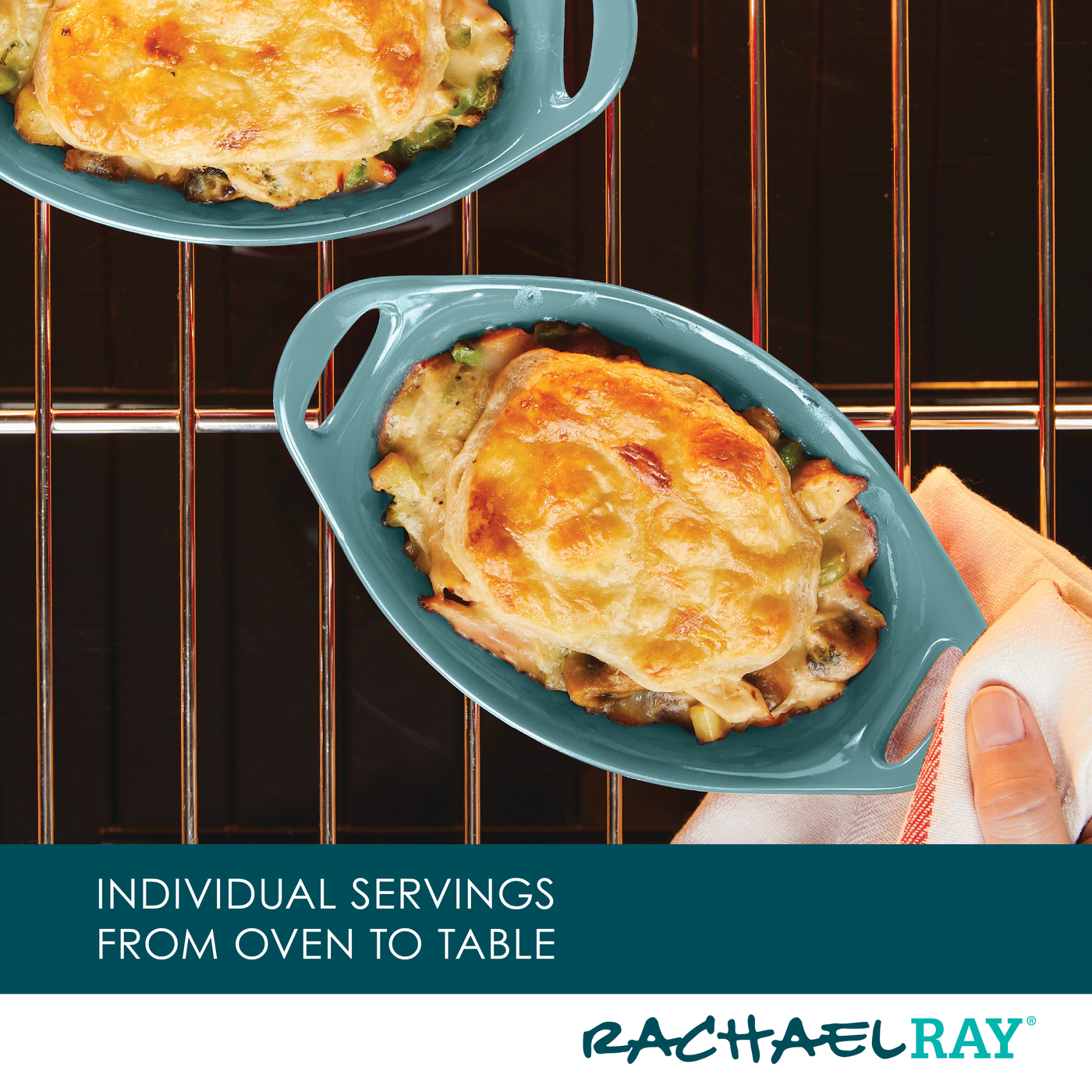 Hand holding dish of baked cheesy casserole on oven rack.