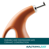 Close-up of a ceramic oil dispenser handle and spout.