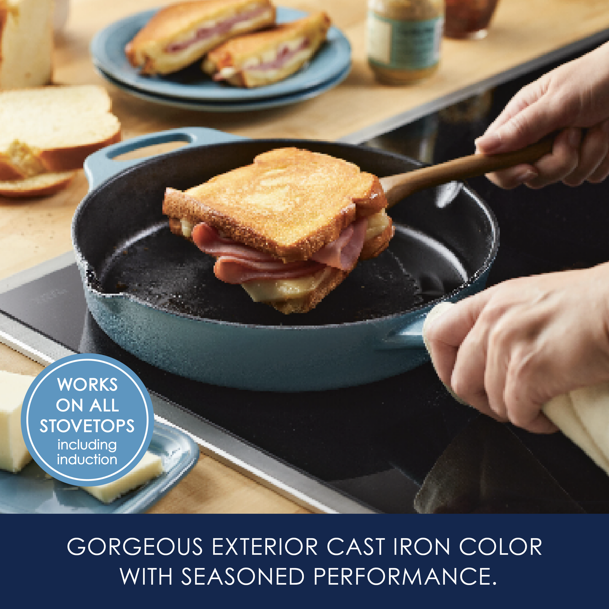 Someone cooking a sandwich in a blue cast iron skillet on a stovetop.