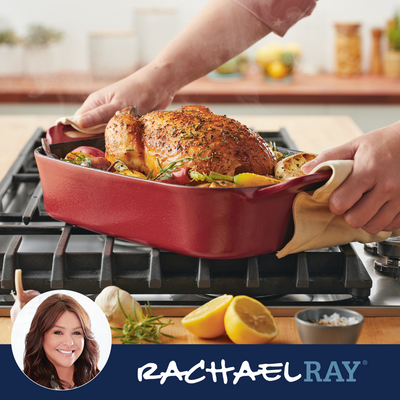 Person placing roasted chicken in a red dish on a stove.