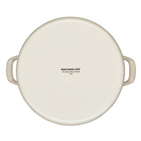 Round ceramic baking dish with handles, viewed from above.