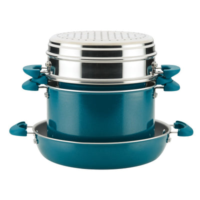 Stacked blue cookware set with lids and handles.