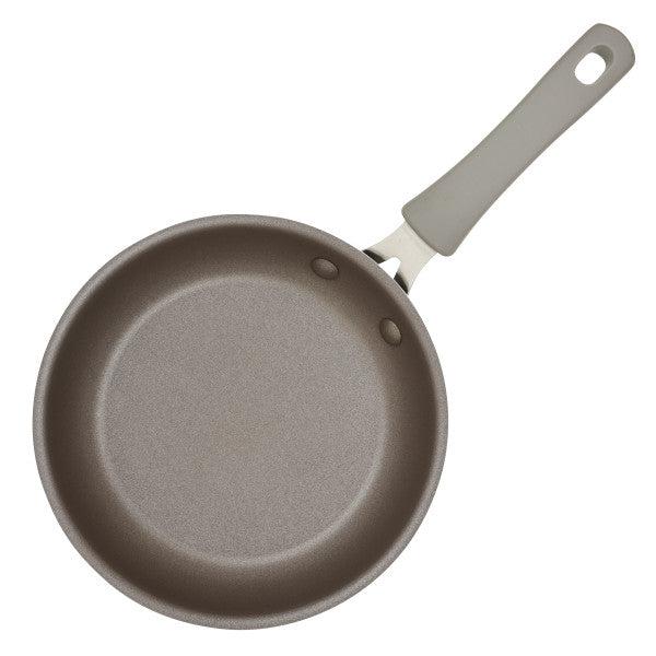 Gray Cook + Create Nonstick Frying Pan with a handle, designed from thicker gauge aluminum and seen from above.
