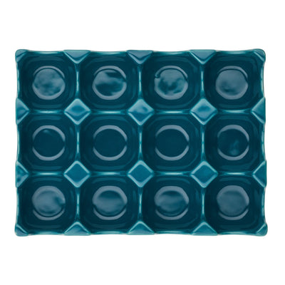 Rectangular ceramic tray with a teal grid pattern.
