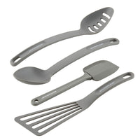 Four cooking utensils from the 4-Piece Kitchen Tool Set, crafted in gray nylon suitable for nonstick surfaces, are elegantly displayed on a white background. Designed to enhance your culinary experience, they are dishwasher-safe for easy cleaning.