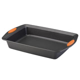 Black baking pan with orange handles on a white background.