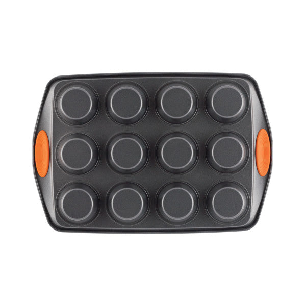 The 12-Cup Nonstick Cupcake & Muffin Pan is made from heavy gauge steel with orange silicone grips, accommodates 12 muffins, and features a dependable nonstick surface.