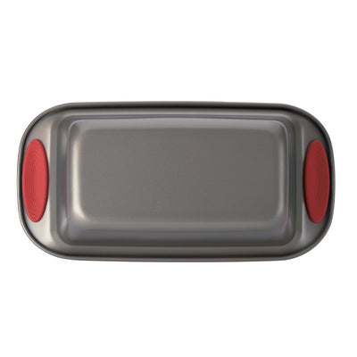 Rectangular baking tray with red silicone handles.