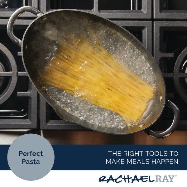 An 8-Quart Professional Nonstick Oval Hard Anodized Stockpot bubbles with spaghetti boiling on the stove, showcasing the Rachael Ray brand's flair.