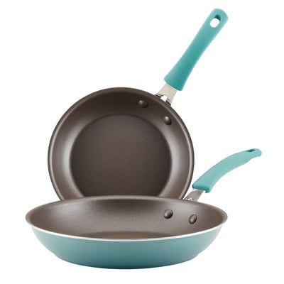 Two non-stick frying pans with teal handles stacked together.