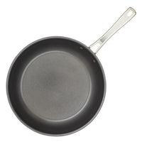 The Cook + Create Hard Anodized Nonstick Frying Pan, made from hard-anodized aluminum, showcases a triple-layer nonstick surface and a sleek metal handle, displayed from above.