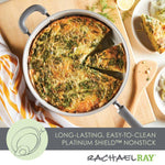 Frittata in a nonstick pan with a slice cut out, wooden spatula beside it.