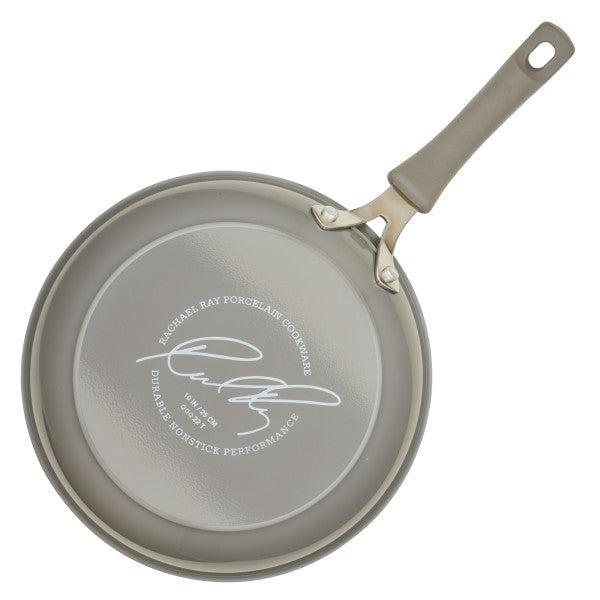 This high-performance Cook + Create Nonstick Frying Pan, featuring a gray finish and a plastic handle, is crafted from thicker gauge aluminum for even heat distribution, as observed from above.
