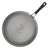 The Cook + Create Hard Anodized Nonstick Frying Pan, gray in color with a black handle, is viewed from above and showcases a triple-layer nonstick surface for easy cooking.