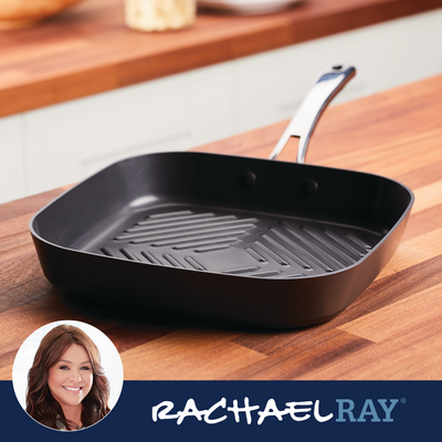 A square grill pan on a wooden countertop, with a logo and a woman's photo inset.