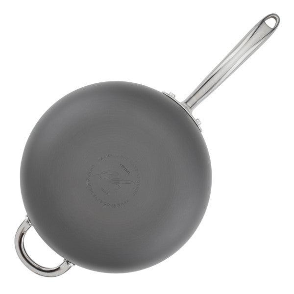 This professional hard-anodized nonstick saucier, viewed from above, comes with a sleek stainless steel handle and is available in gray.