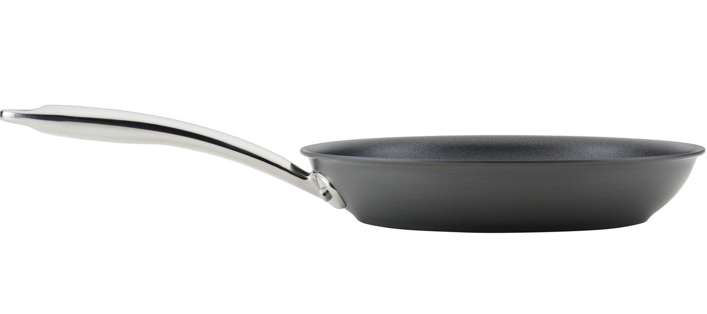 The side view of the non-stick frying pan with a metal handle from the 11-Piece Professional Hard-Anodized Nonstick and Induction Stainless Steel Cookware Set is a sleek addition to any kitchen. This stainless steel cookware piece combines durability with style for outstanding performance.