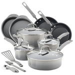 A set of gray non-stick cookware with utensils.