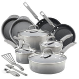 A set of gray non-stick cookware with utensils.