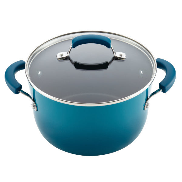 Classic Brights Nonstick Cookware Sets feature a blue cooking pot with a glass lid and two sturdy handles.