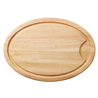 Oval wooden cutting board with a groove and a notch on one side.