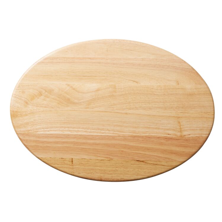 Round wooden cutting board on a white background.