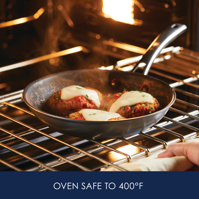 Pan with food baking in an oven, labeled "Oven Safe to 400°F.