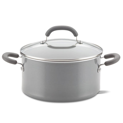 A gray cooking pot with a glass lid and black handles.