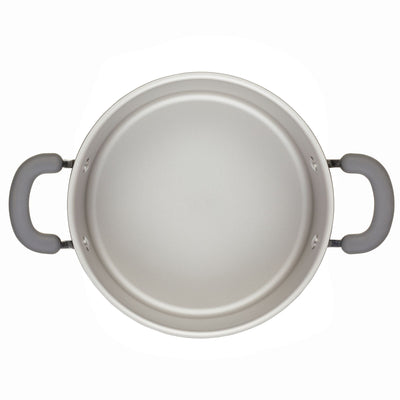 Top view of a round cooking pot with two gray handles on the sides.