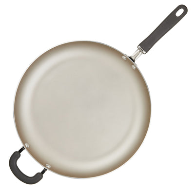 Nonstick frying pan with a long handle and a helper handle on the side.