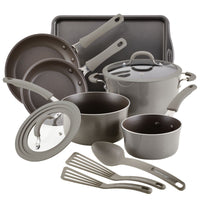 Set of non-stick cookware with pots, pans, lids, and utensils in gray.