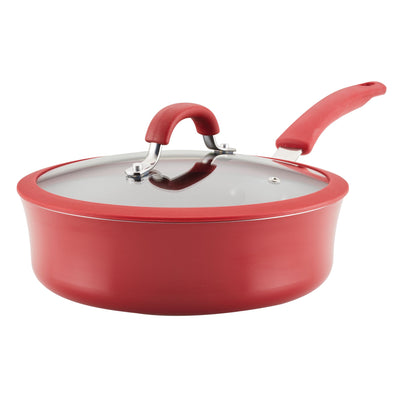 Red non-stick pan with a glass lid and red handle.