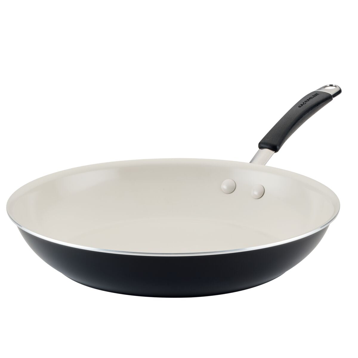 Black frying pan with a white interior and a handle.