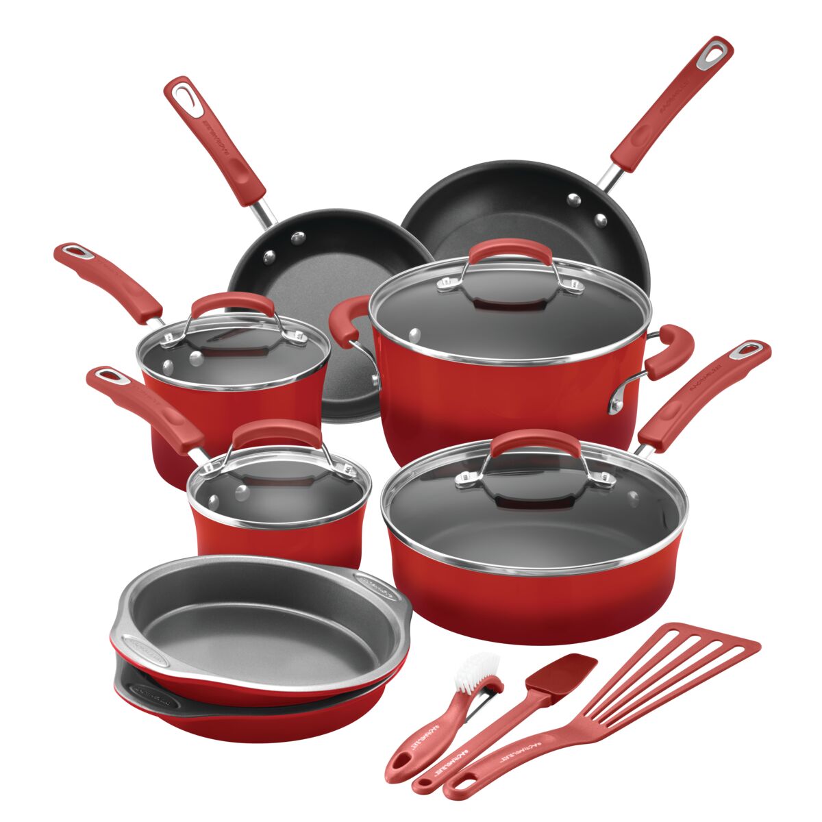 Red cookware set with pots, pans, and utensils on white background.
