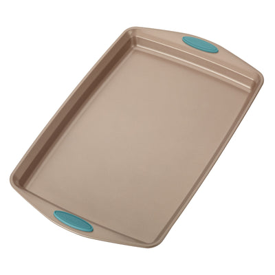 A rectangular baking sheet with blue silicone grips on the handles.