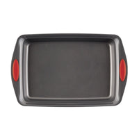 Rectangular baking pan with red silicone grips on both handles.